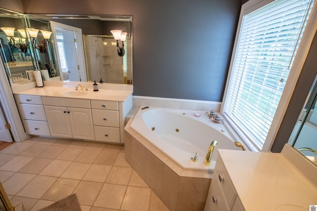 129 Wayne Cir, New Concord, KY 42076 - full bathroom with a shower stall, tile patterned flooring, a whirlpool tub, vanity, and a chandelier