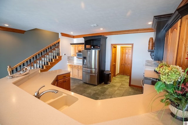 129 Wayne Cir, New Concord, KY 42076 - kitchen with stainless steel appliances, light countertops, crown molding, and recessed lighting