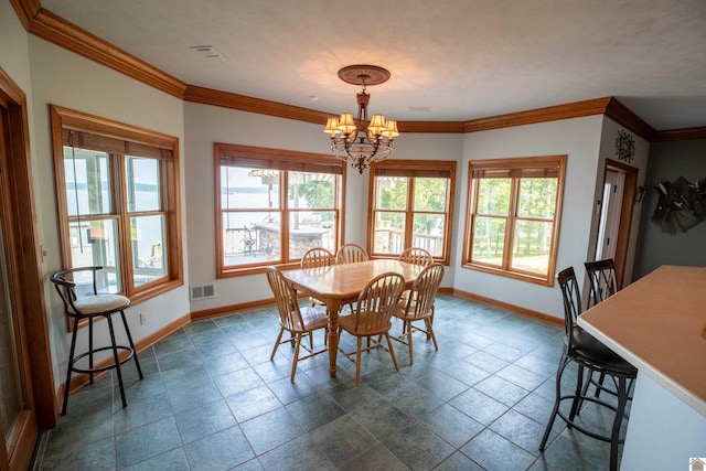 129 Wayne Cir, New Concord, KY 42076 - dining space with a chandelier and crown molding