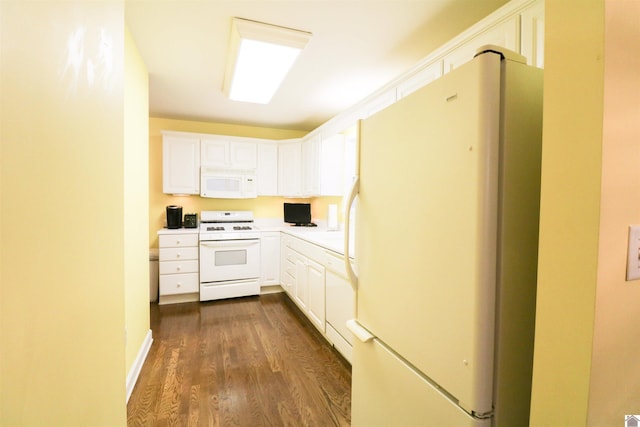 2567 Clay St, Paducah, KY 42001 - kitchen featuring white appliances, dark wood finished floors, white cabinets, and light countertops