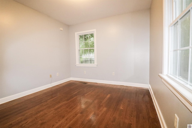2567 Clay St, Paducah, KY 42001 - spare room with dark wood-style flooring and baseboards
