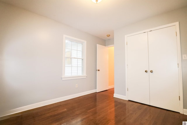 2567 Clay St, Paducah, KY 42001 - unfurnished bedroom featuring wood finished floors and a closet
