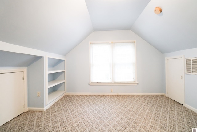 2567 Clay St, Paducah, KY 42001 - additional living space with light colored carpet and lofted ceiling
