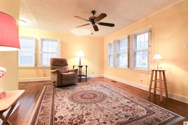 2567 Clay St, Paducah, KY 42001 - living area featuring healthy amount of natural light, wood finished floors, and ceiling fan