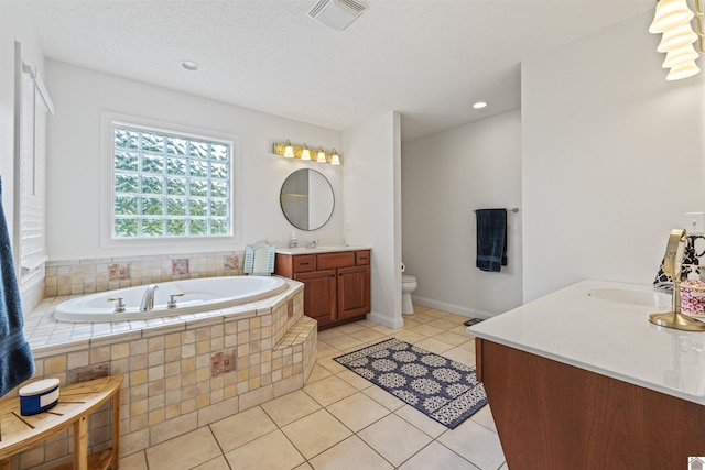 130 Camden Way, Paducah, KY 42001 - full bath with two vanities, a garden tub, tile patterned floors, and recessed lighting