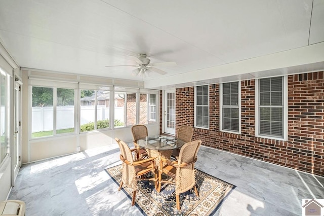 1530 Holt Rd, Paducah, KY 42001 - sunroom / solarium featuring brick wall, ceiling fan, and outdoor dining space