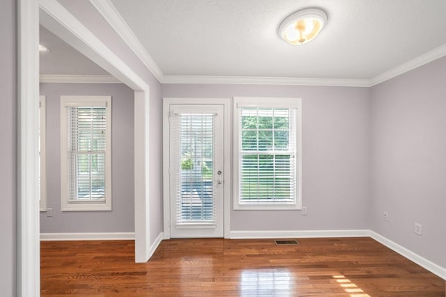 1530 Holt Rd, Paducah, KY 42001 - empty room featuring wood finished floors and ornamental molding