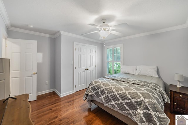 1530 Holt Rd, Paducah, KY 42001 - bedroom featuring wood finished floors, crown molding, a closet, and a ceiling fan