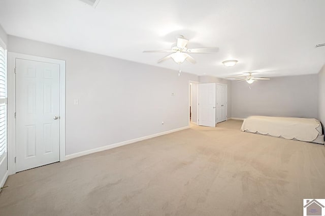 1530 Holt Rd, Paducah, KY 42001 - unfurnished bedroom featuring light carpet and ceiling fan