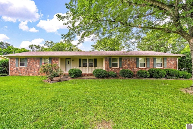 301 Tremont Dr, Hopkinsville, KY 42240 - ranch-style house featuring a porch, a front lawn, and brick siding