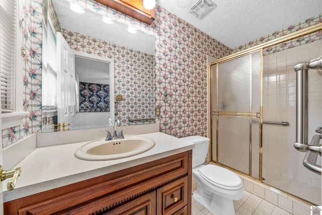 301 Tremont Dr, Hopkinsville, KY 42240 - bathroom with wallpapered walls, a textured ceiling, a stall shower, vanity, and tile patterned flooring