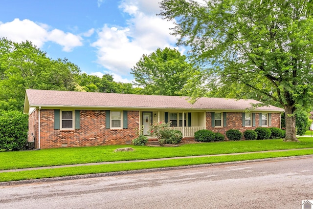 301 Tremont Dr, Hopkinsville, KY 42240 - ranch-style house featuring brick siding, a front yard, covered porch, and crawl space