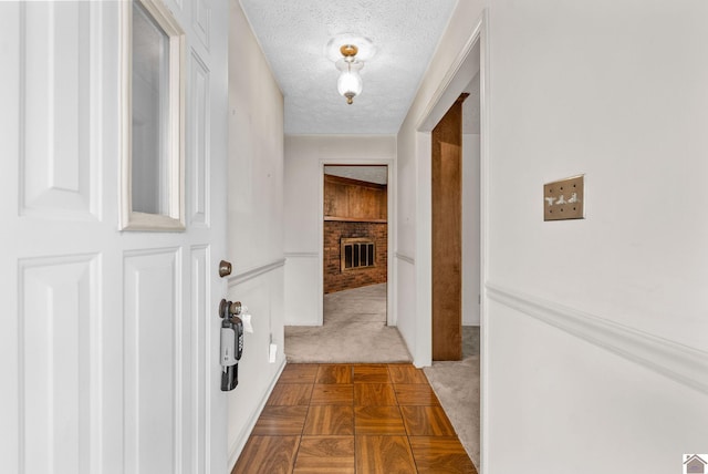 301 Tremont Dr, Hopkinsville, KY 42240 - hallway with carpet flooring and a textured ceiling