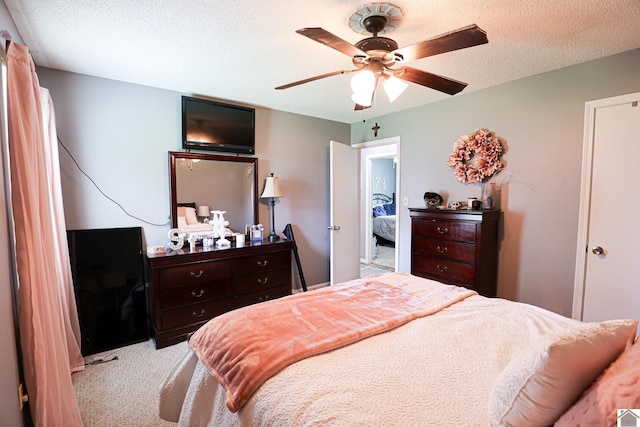 1040 Weda Cir, Mayfield, KY 42066 - carpeted bedroom with a textured ceiling and a ceiling fan