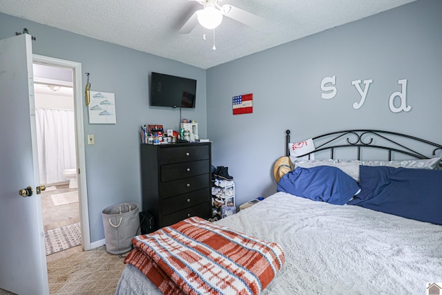 1040 Weda Cir, Mayfield, KY 42066 - carpeted bedroom with a textured ceiling and a ceiling fan