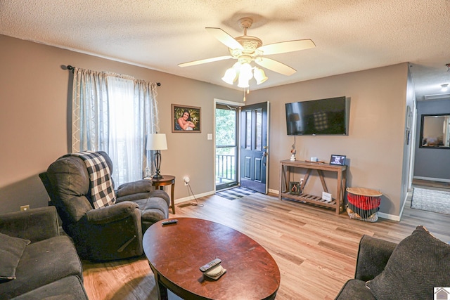 1040 Weda Cir, Mayfield, KY 42066 - living area with wood finished floors, a textured ceiling, and ceiling fan