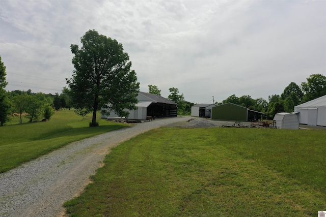 20715 Dawson Springs Rd, Dawson Springs, KY 42408 - view of front facade with an outbuilding, gravel driveway, and a front yard