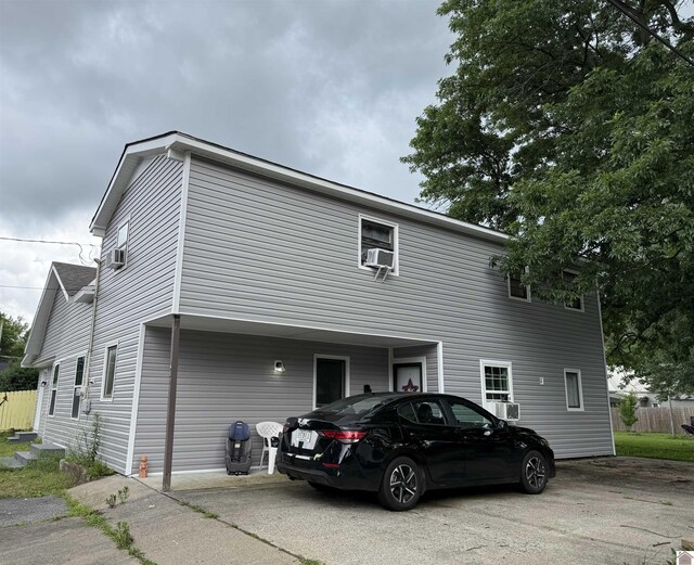 403 N 19th St, Paducah, KY 42001 - view of home's exterior with driveway and cooling unit