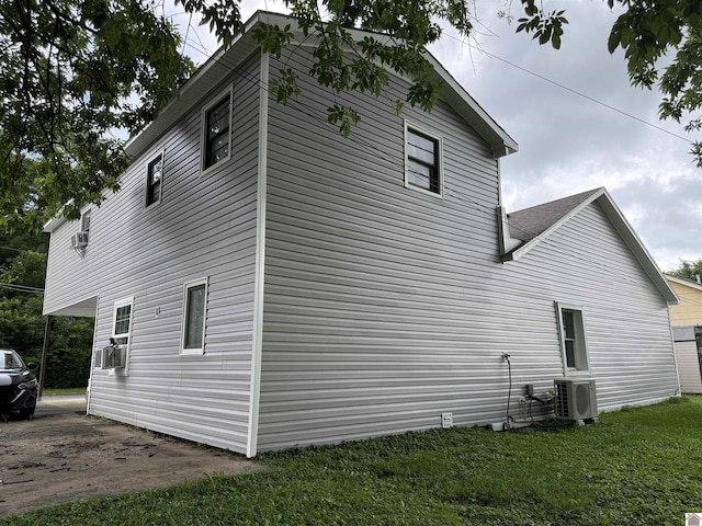 403 N 19th St, Paducah, KY 42001 - view of side of home featuring an ac unit and a yard