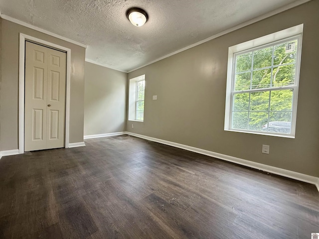 403 N 19th St, Paducah, KY 42001 - spare room with crown molding, a textured ceiling, and dark wood-style floors