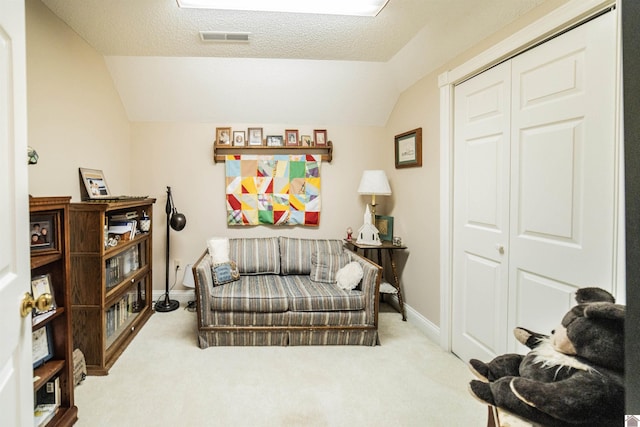 1201 Winslow Way, Paducah, KY 42001 - living area featuring lofted ceiling, carpet, and a textured ceiling