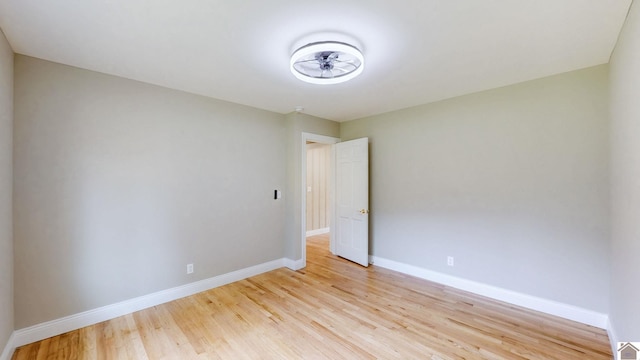 700 S 16th, Murray, KY 42071 - unfurnished room with baseboards and light wood-style flooring