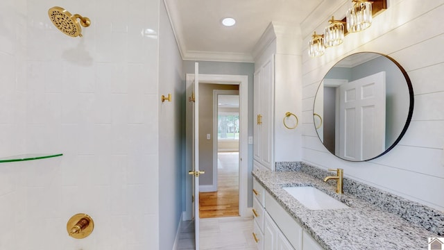700 S 16th, Murray, KY 42071 - bathroom featuring vanity, crown molding, and a tile shower