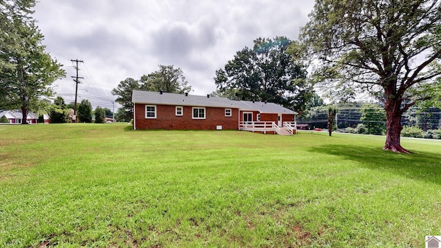 700 S 16th, Murray, KY 42071 - rear view of property featuring a yard and brick siding