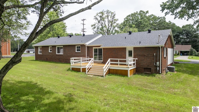 700 S 16th, Murray, KY 42071 - rear view of house featuring brick siding, a deck, a lawn, a shingled roof, and crawl space