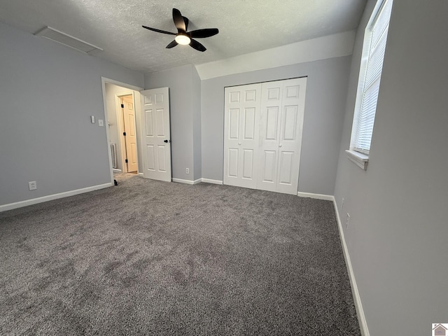2042 Carneal Ln, Oak Grove, KY 42262 - unfurnished bedroom featuring a textured ceiling, a closet, carpet, and ceiling fan