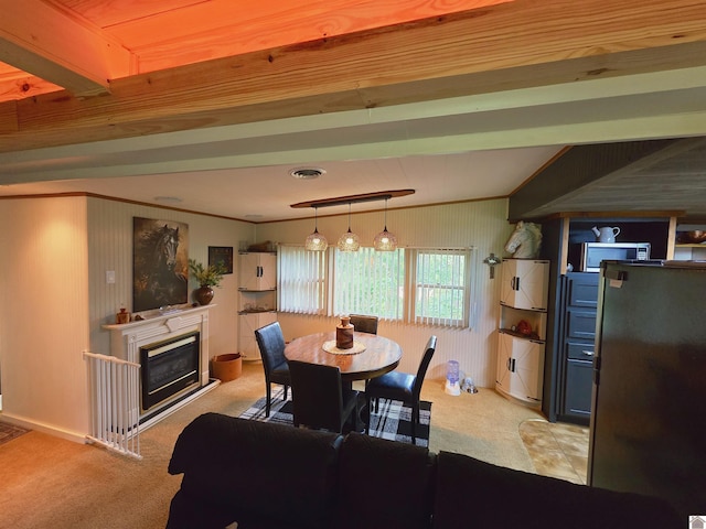 1040 Shine Ln, Cadiz, KY 42211 - carpeted dining space with ornamental molding, a glass covered fireplace, and lofted ceiling