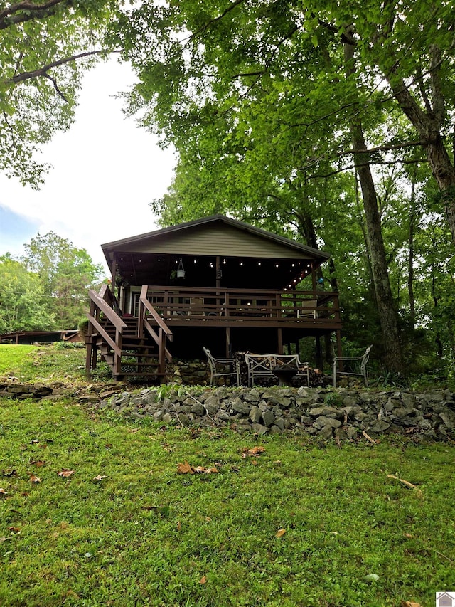 1040 Shine Ln, Cadiz, KY 42211 - back of property with a deck and stairway