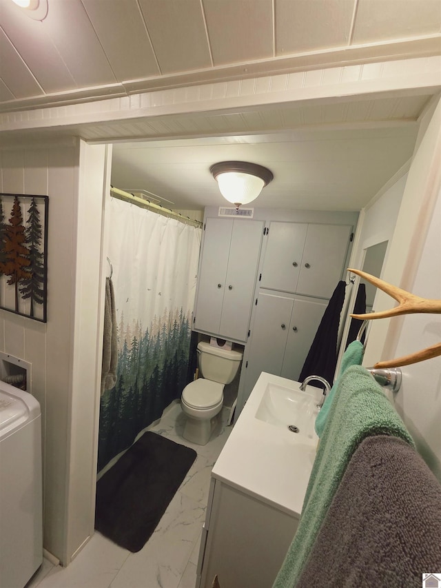 1040 Shine Ln, Cadiz, KY 42211 - full bathroom with vanity, marble look tile flooring, washer / dryer, and a shower with shower curtain