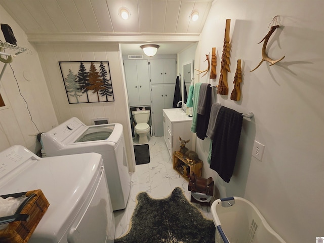 1040 Shine Ln, Cadiz, KY 42211 - washroom featuring separate washer and dryer, light marble finish flooring, wooden ceiling, and recessed lighting