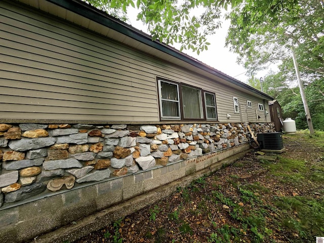 1040 Shine Ln, Cadiz, KY 42211 - view of home's exterior featuring stone siding and a cooling unit