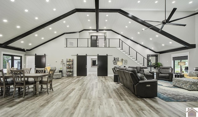1 Logan Trl, Murray, KY 42071 - living area featuring a barn door, light wood-type flooring, recessed lighting, high vaulted ceiling, and a ceiling fan