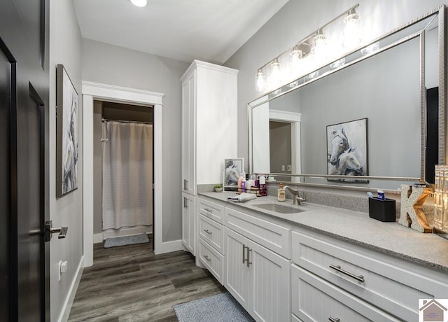 1 Logan Trl, Murray, KY 42071 - bathroom with vanity and wood finished floors