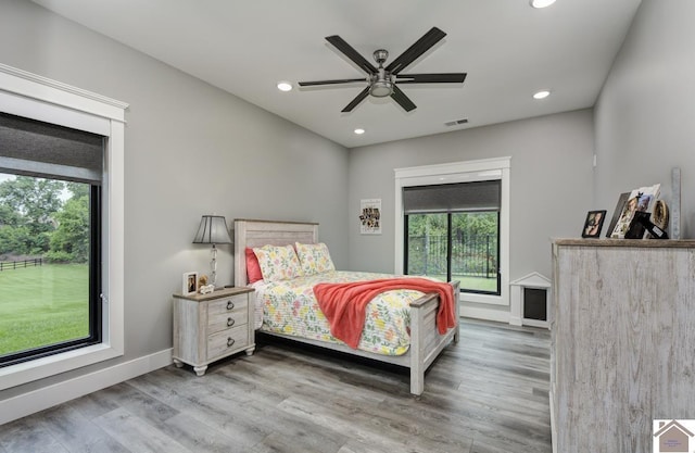 1 Logan Trl, Murray, KY 42071 - bedroom featuring multiple windows, recessed lighting, wood finished floors, and a ceiling fan