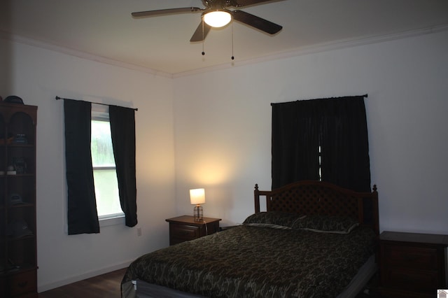 779 State Route 564, Mayfield, KY 42066 - bedroom with ornamental molding, dark wood finished floors, and ceiling fan