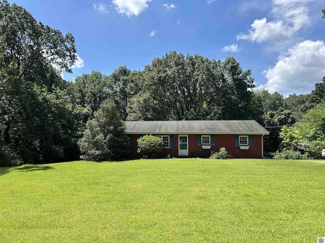 2153 Horace Barnes Rd, Calvert City, KY 42029 - single story home featuring a front yard