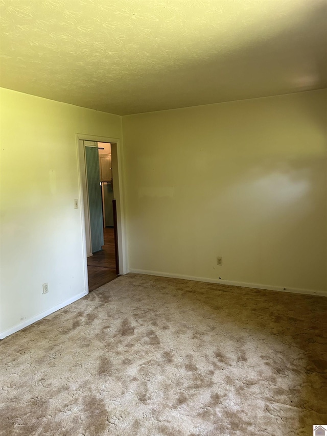 2153 Horace Barnes Rd, Calvert City, KY 42029 - empty room with carpet floors and baseboards
