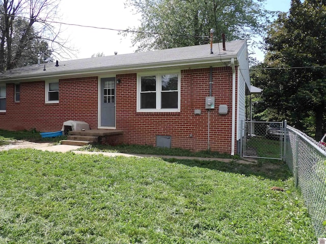 719 Elder St, Calvert City, KY 42029 - view of front of home featuring brick siding