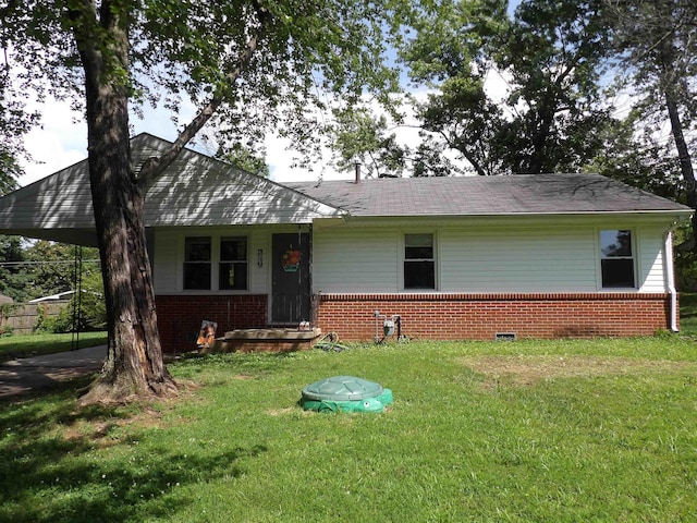 719 Elder St, Calvert City, KY 42029 - view of front of property with brick siding and a front yard