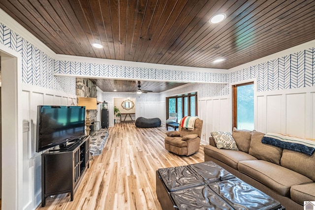 150 Sills Ln, Benton, KY 42025 - living room featuring wallpapered walls, wooden ceiling, a decorative wall, hardwood / wood-style flooring, and wainscoting