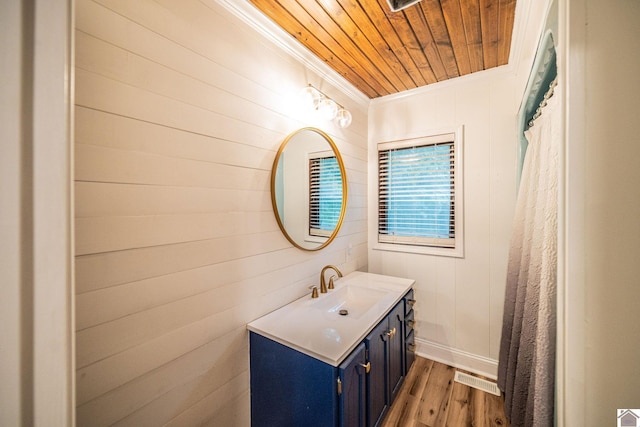 150 Sills Ln, Benton, KY 42025 - bathroom with ornamental molding, wooden ceiling, vanity, wood finished floors, and wooden walls