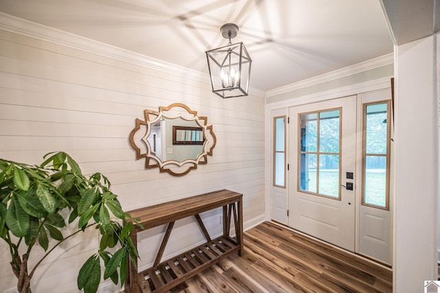 150 Sills Ln, Benton, KY 42025 - entryway with wood finished floors, a chandelier, crown molding, and wood walls