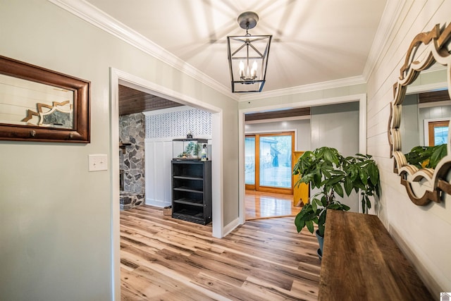 150 Sills Ln, Benton, KY 42025 - corridor with wood finished floors, a chandelier, and ornamental molding