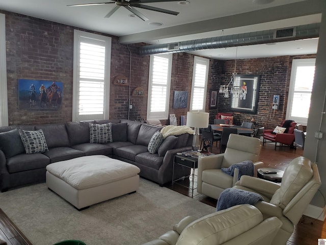 117 N 2nd, Paducah, KY 42001 - living room featuring brick wall, a ceiling fan, healthy amount of natural light, and wood finished floors