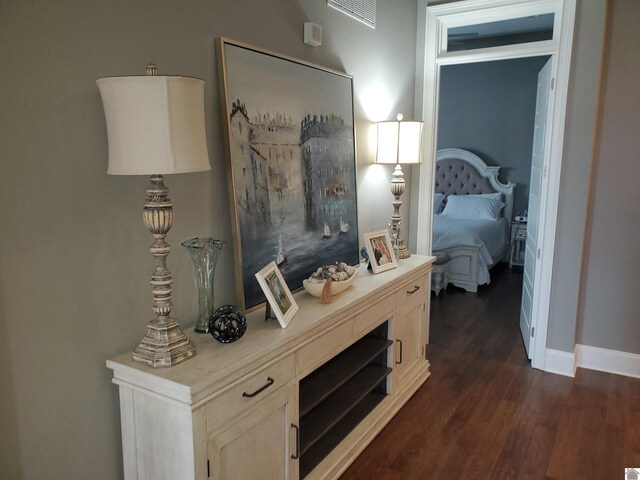 117 N 2nd, Paducah, KY 42001 - hall featuring dark wood-style flooring and baseboards