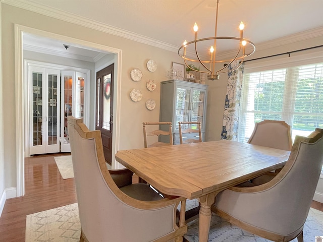 1514 Martin Chapel, Murray, KY 42071 - dining room featuring french doors, a chandelier, wood finished floors, and ornamental molding